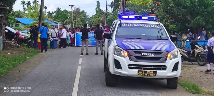 Sat Lantas Polres Sarmi Amankan Jalur dan Kawal Rangkaian Hari Ikan Nasional XII di Kota Sarmi