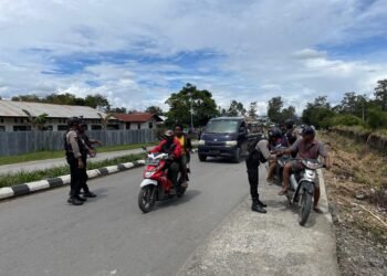 Sat Reskrim Polres Jayawijaya Salurkan 5 Ton Beras Gpm Untuk Masyarakat di Jalan Pramuka