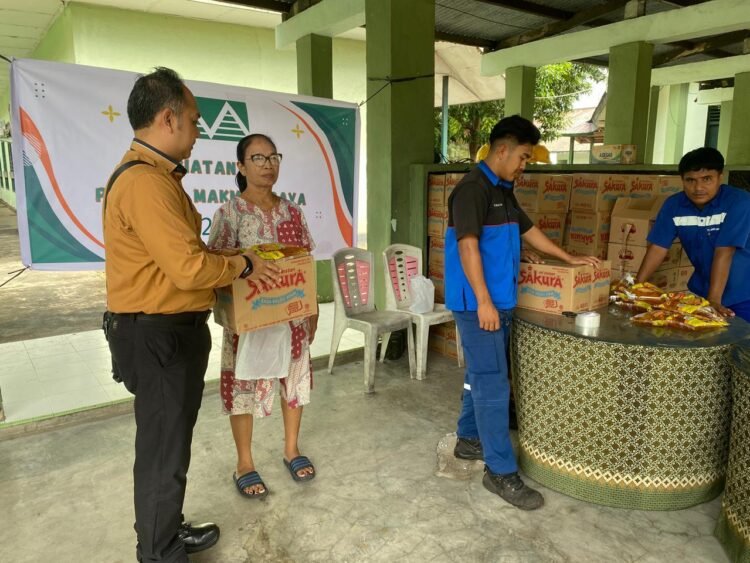 Sinergi Kodim 1310/Bitung Dan PT. Agro Makmur Raya (AMR) Gelar Aksi Sosial Bagi-Bagi Sembako