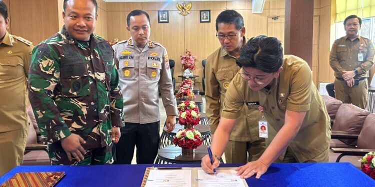 Wujud Sinergitas TNI dan Pemerintah Daerah, Dandim 1310/Bitung Tandatangani Karya Bakti Revitalisasi Marshalling Area Yon TP 916 Makawidey