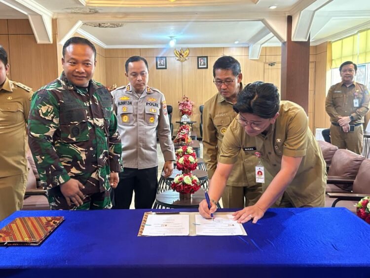 Wujud Sinergitas TNI dan Pemerintah Daerah, Dandim 1310/Bitung Tandatangani Karya Bakti Revitalisasi Marshalling Area Yon TP 916 Makawidey