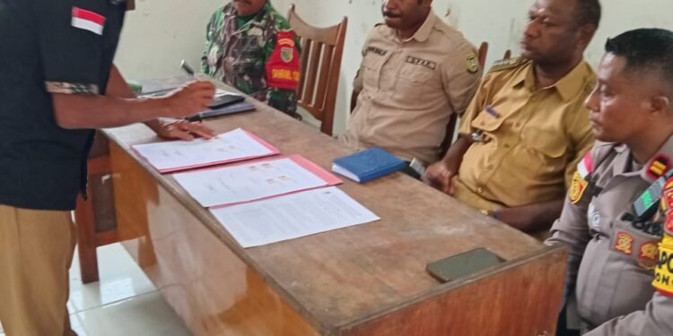 Kapolsek Bonggo Hadiri Penyelesaian Dokumen Penetapan Batas Administrasi Kampung Tarawasih Marenggi